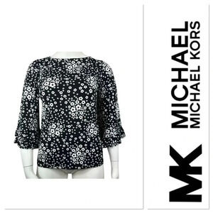 Michael Kors black top with white floral size medium